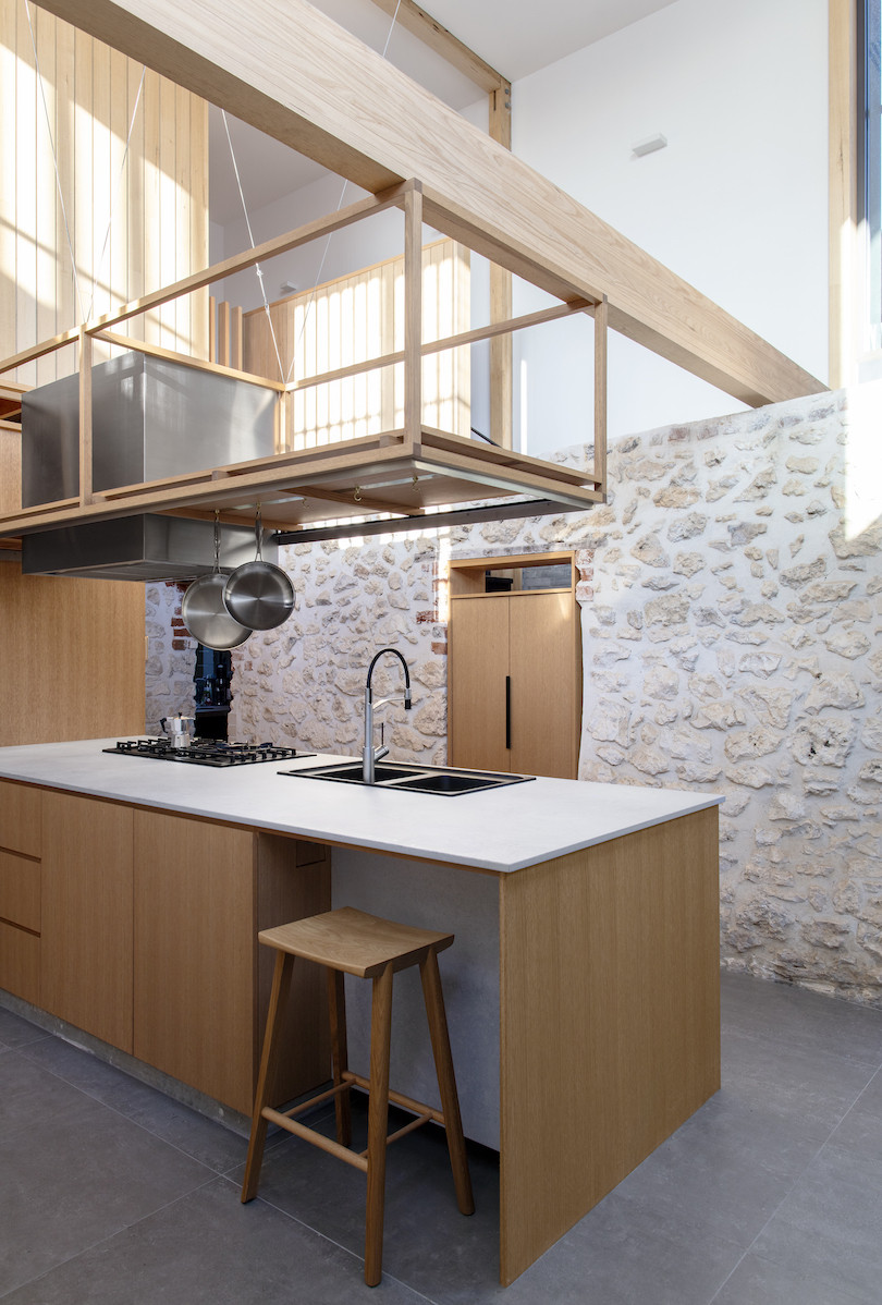The historic limestone kitchen of Orient Street House by Philip Stejskal